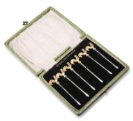 A SET OF SIX STERLING SILVER COCKTAIL STICKS