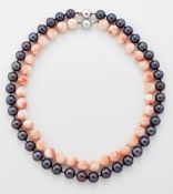 A CORAL BEAD NECKLACE AND A CULTURED PEARL NECKLACE