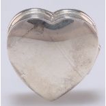 AN ELIZABETH II SMALL SILVER HEART-SHAPED BOX