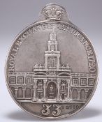 A GEORGE IV SILVER ROYAL EXCHANGE FIREMAN'S ARM BADGE