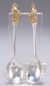 A PAIR OF ELIZABETH II SILVER AND PARCEL-GILT SPOONS