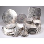 A QUANTITY OF SILVER-PLATED COASTERS AND PLACE MATS