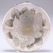 A JAPANESE SILVER AND PARCEL-GILT COMPACT