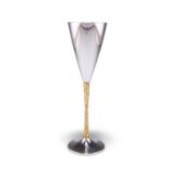 AN ELIZABETH II PARCEL-GILT SILVER CHAMPAGNE FLUTE