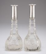 A PAIR OF GEORGE V SILVER-MOUNTED CUT-GLASS SCENT BOTTLES
