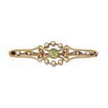 A LATE VICTORIAN PERIDOT AND SEED PEARL BROOCH