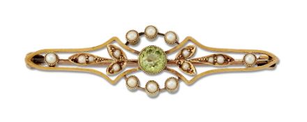 A LATE VICTORIAN PERIDOT AND SEED PEARL BROOCH