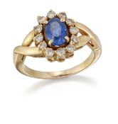 A SAPPHIRE AND DIAMOND CLUSTER RING