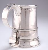 A GEORGE III SILVER TANKARD