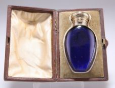 A VICTORIAN GOLD-MOUNTED BLUE-GLASS SCENT BOTTLE
