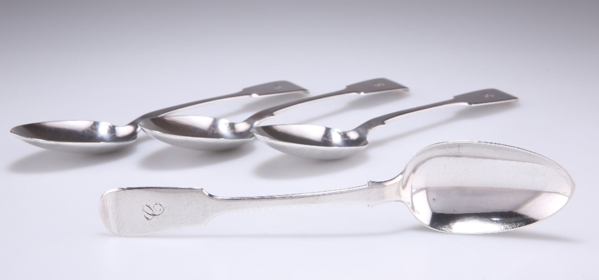 A SET OF FOUR EARLY VICTORIAN SILVER TABLESPOONS