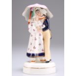 A STAFFORDSHIRE PORCELLANEOUS FIGUR, "UMBRELLA COURTSHIP"