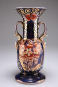 A MASONS IRONSTONE "SCHOOL HOUSE" PATTERN TWO-HANDLED VASE