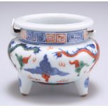 A SMALL CHINESE DOUCAI PORCELAIN TRIPOD CENSER