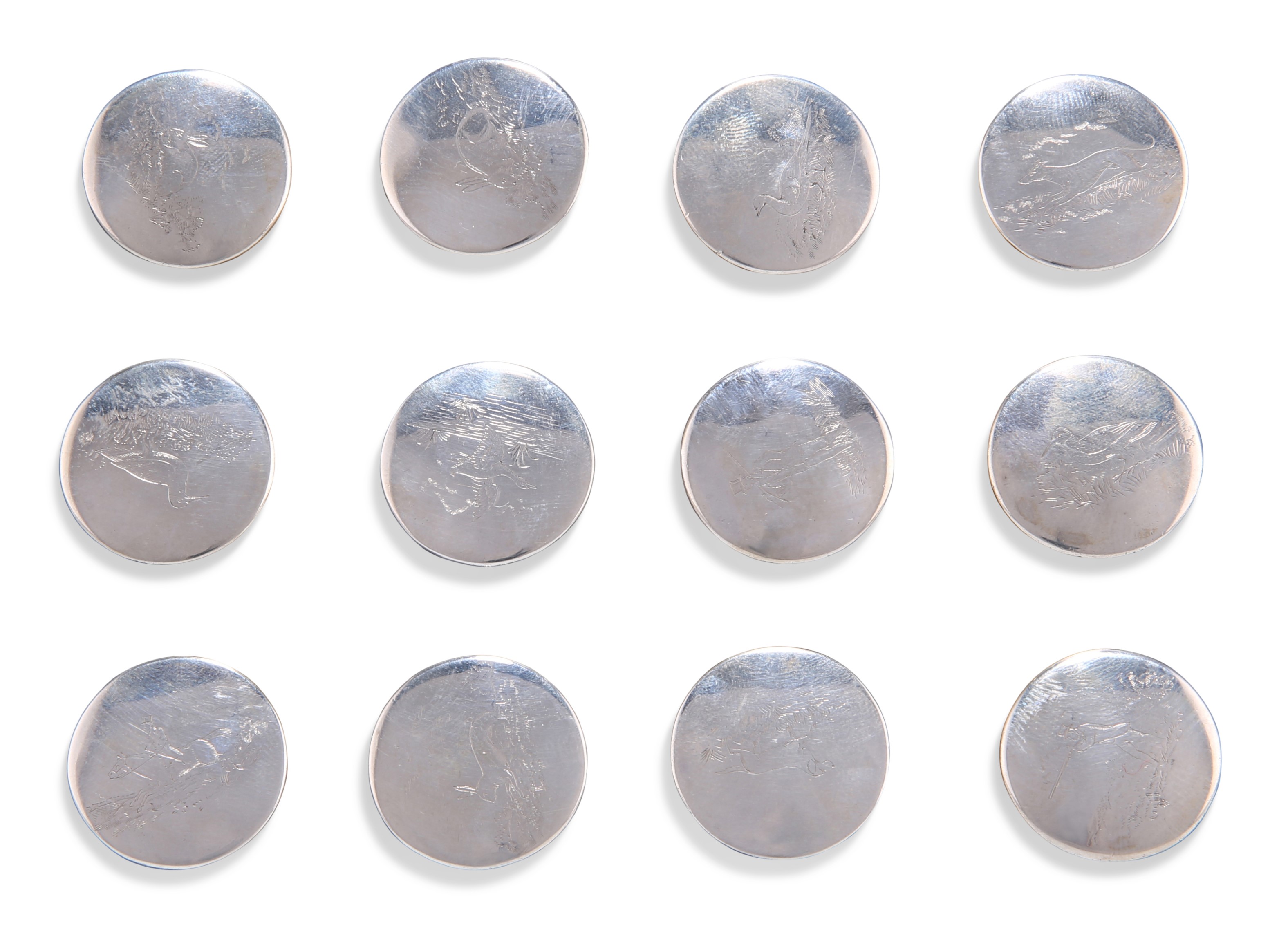 A SET OF TWELVE GEORGE III SILVER HUNT BUTTONS