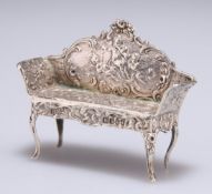 A GERMAN SILVER MINIATURE MODEL OF A SETTEE