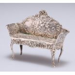 A GERMAN SILVER MINIATURE MODEL OF A SETTEE