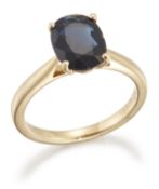 AN 18 CARAT GOLD SOLITAIRE SAPPHIRE RING