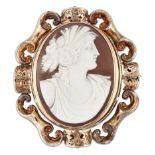 A VICTORIAN SHELL CAMEO AND HAIRWORK BROOCH
