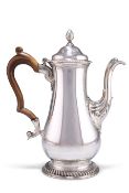 A GEORGE III SILVER COFFEE POT,