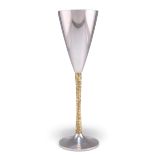 AN ELIZABETH II PARCEL-GILT SILVER CHAMPAGNE FLUTE