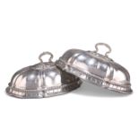 A PAIR OF GEORGE III SILVER DISH COVERS