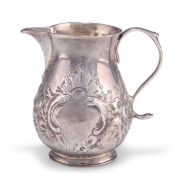 AN EARLY GEORGE II SILVER CREAM JUG