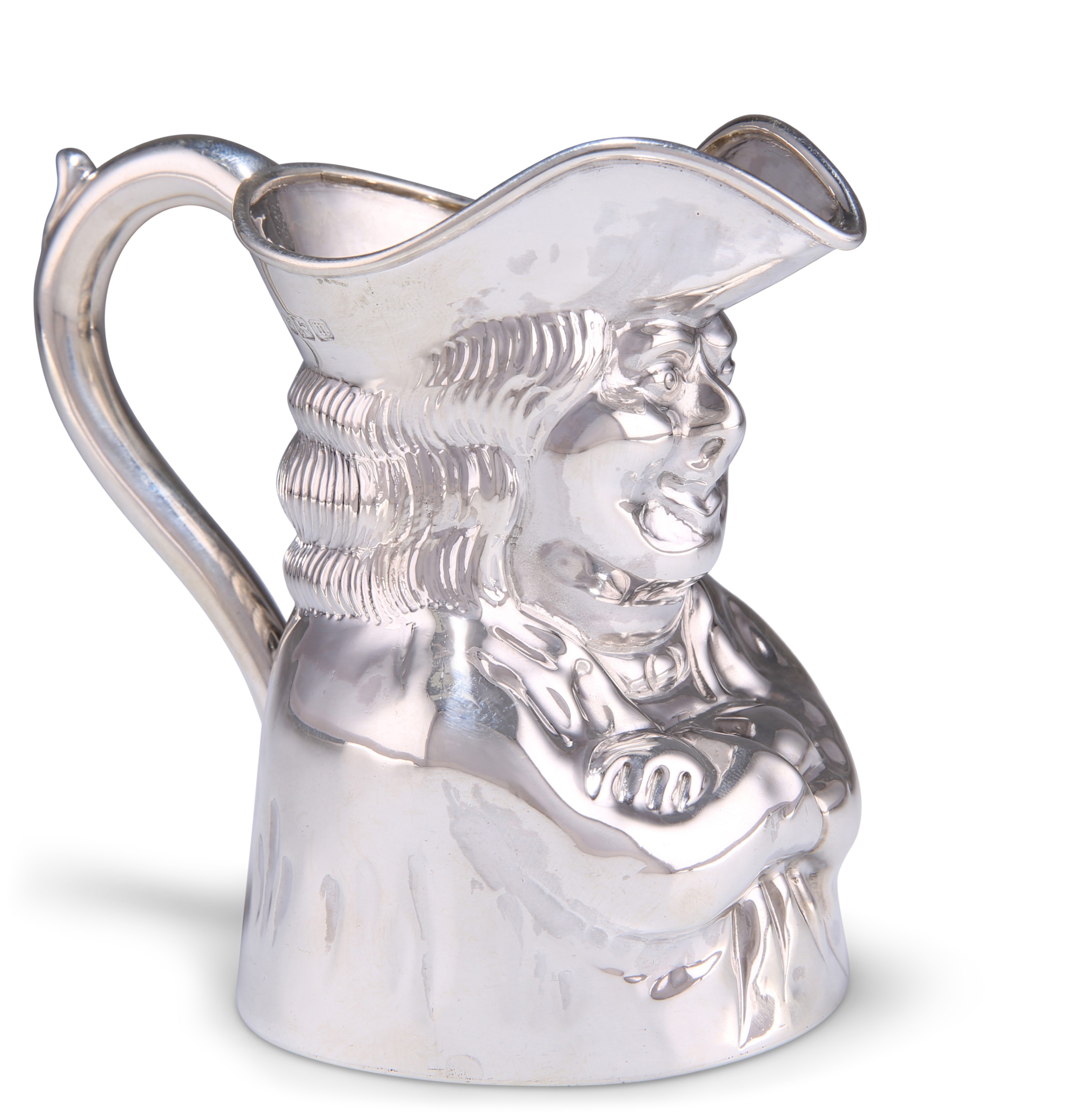 AN EDWARDIAN SILVER TOBY JUG