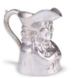 AN EDWARDIAN SILVER TOBY JUG