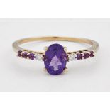 A 9 CARAT GOLD AMETHYST AND DIAMOND RING
