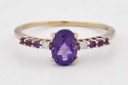 A 9 CARAT GOLD AMETHYST AND DIAMOND RING