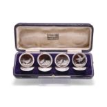 A GEORGE V SET OF FOUR TORTOISESHELL MENU HOLDERS