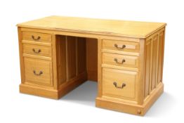 COXWOLD CABINET MAKERS, A UNICORN MAN OAK DESK