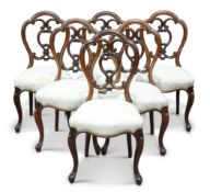 A SET OF SIX VICTORIAN ROSEWOOD PARLOUR CHAIRS