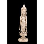 A 19TH CENTURY CHINESE IVORY FIGURE OF GUANYIN