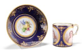A 19TH CENTURY SÈVRES-STYLE 'JEWELLED' CABINET CUP AND SAUCER