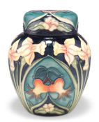 A MOORCROFT POTTERY GINGER JAR AND COVER