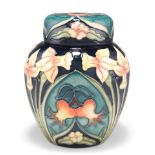 A MOORCROFT POTTERY GINGER JAR AND COVER
