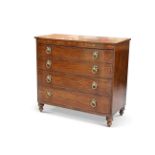 A REGENCY MAHOGANY AND ROSEWOOD CHEST OF DRAWERS