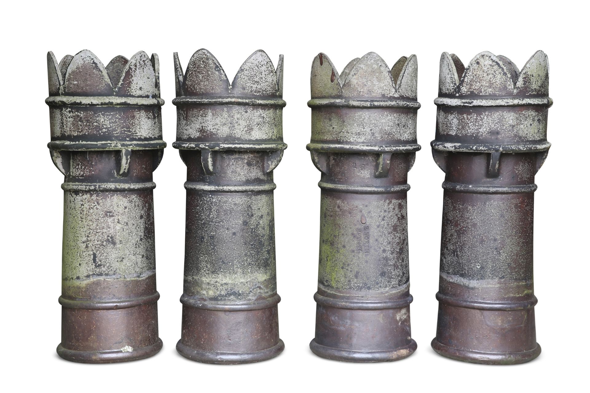 A SET OF FOUR SALT-GLAZED CHIMNEY POTS