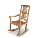 ROBERT THOMPSON OF KILBURN, A MOUSEMAN OAK ROCKING CHAIR