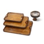 A SET OF THREE VINTAGE OAK STACKING TRAYS