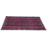 A PERSIAN TORKAMAN RUG