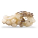 A CHINESE JADE CARVING OF A SQUIRREL AND GRAPES GROUP