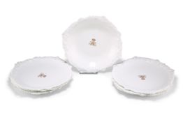 SIX CAULDON CHINA CRESTED DESSERT PLATES AND A DISH, CIRCA 1885