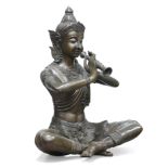 A THAI LARGE BRONZE OF A FLAUTIST