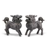 A PAIR OF CHINESE BRONZE MODELS OF QILIN