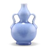 A CHINESE BLUE-GLAZED GOURD VASE