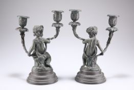 A PAIR OF BRONZE TWO-LIGHT CANDELABRA