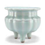 A CHINESE CELADON TRIPOD CENSER